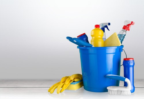 Office cleaning team sanitising desks and shared areas in Tufnellpark