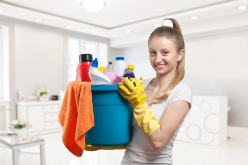 Cleaner wearing PPE during a carpet cleaning job